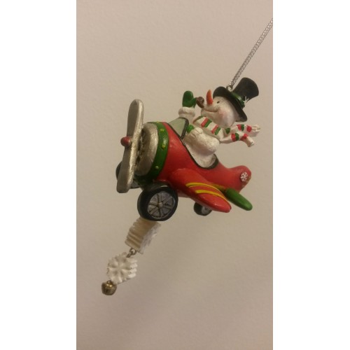 Pupazzo di neve in aereo rosso (996295)